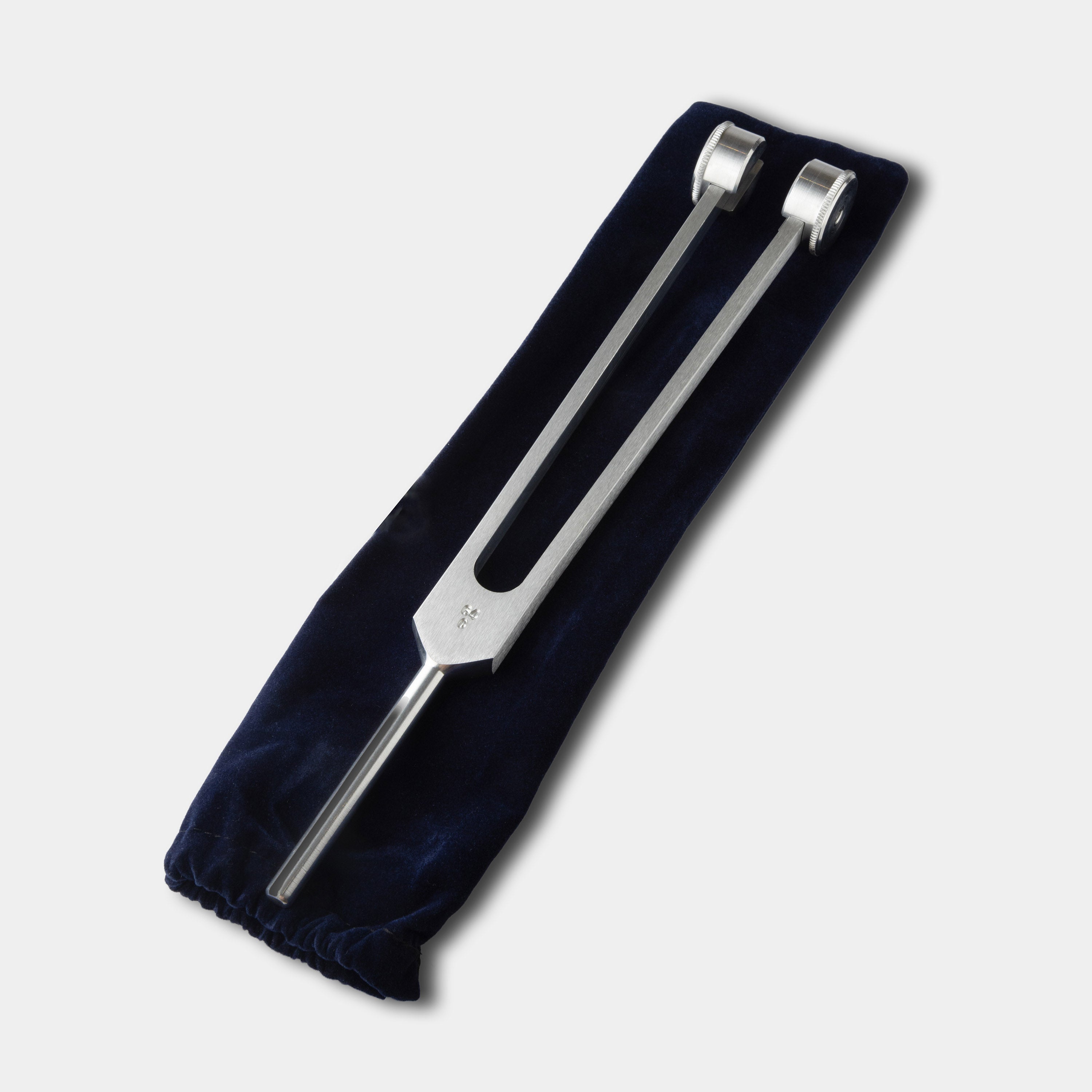 Single tuning for. 64 HZ from Otto weighted Tuning Forks set of 3 on velvet pouch