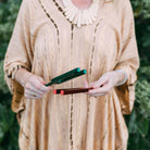 Own Chyla Walsh holding two tuning forks from the phase 1 EVT technique coure