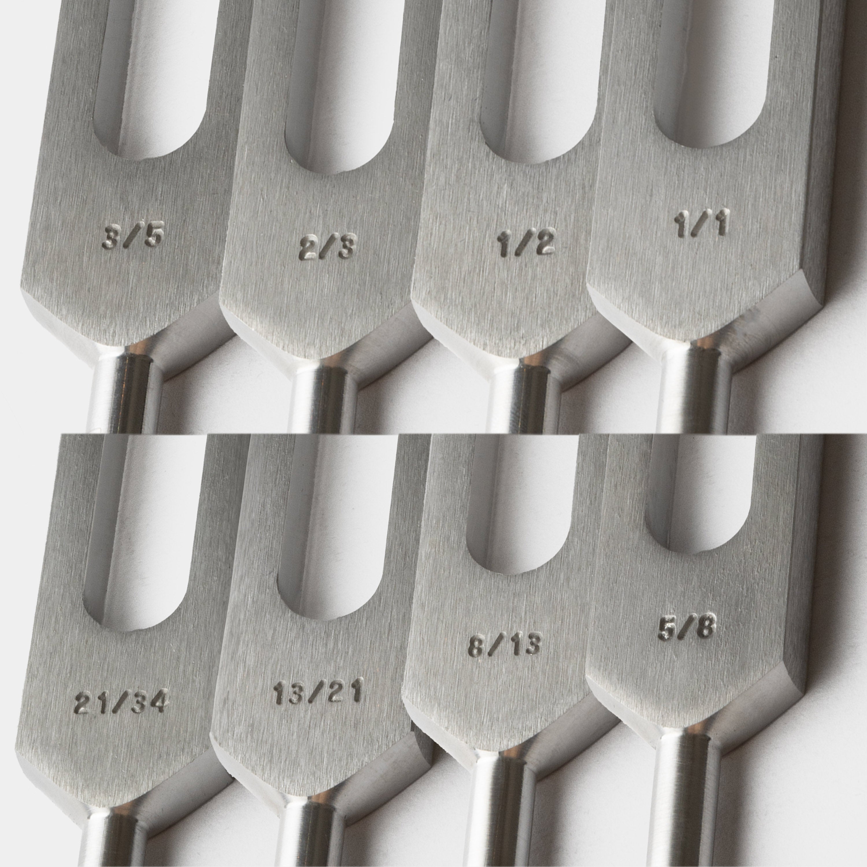 close up of hz fibonacci tuning fork set of 8